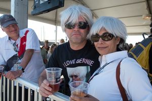 A couple, both dressed up as Bernie Ecclestone, with wigs